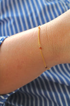 Pulsera con múltiples piedras de nacimiento: Granate (enero) - Manifestación