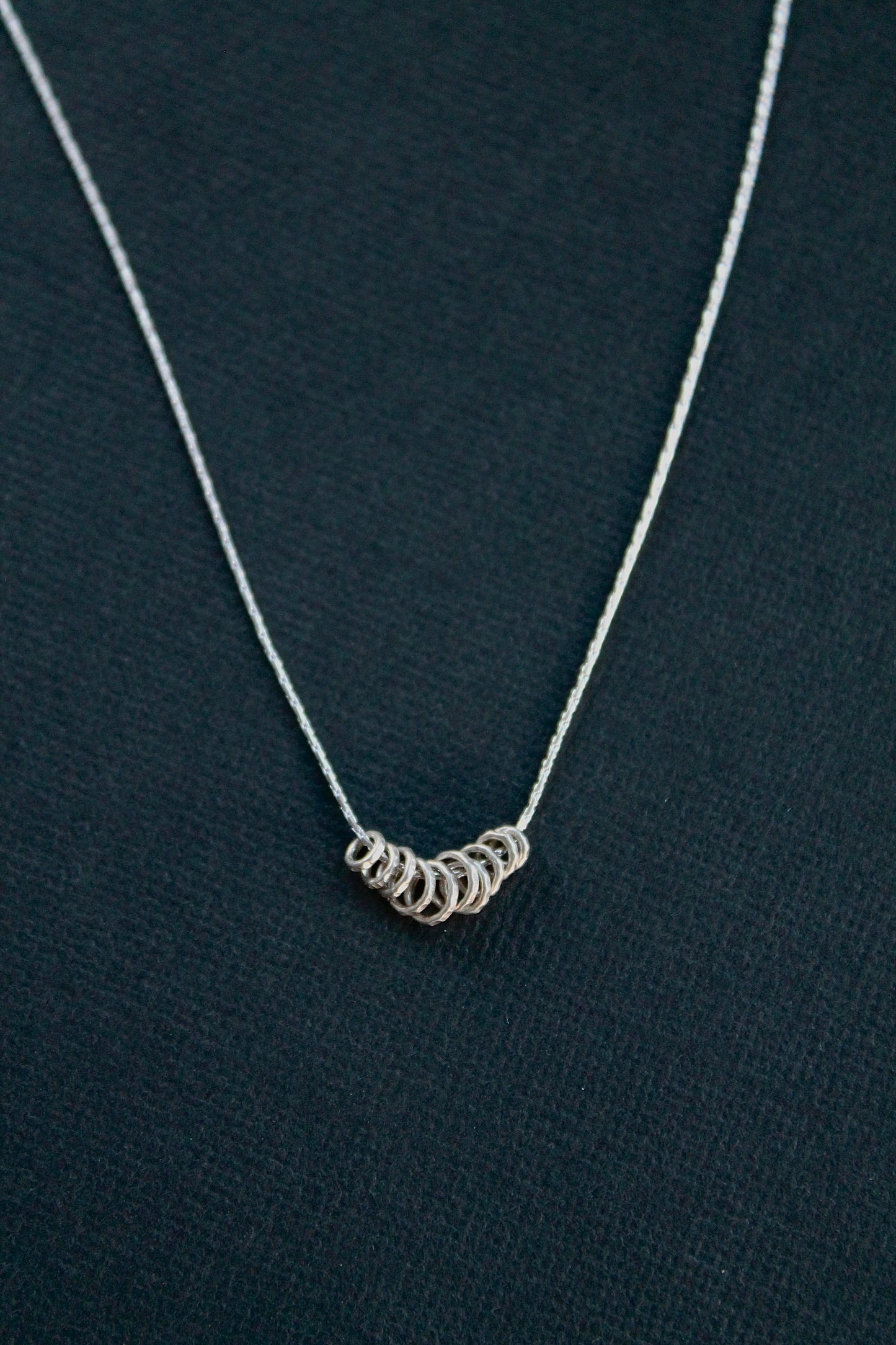 FLOATING DISCS NECKLACE - STERLING SILVER