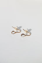 Enfile-aiguilles en résine « Averses d'avril »