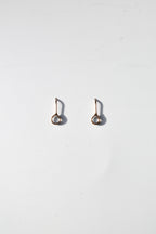 Enfile-aiguilles en résine « Averses d'avril »