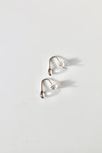 Enfile-aiguilles en résine « Averses d'avril »