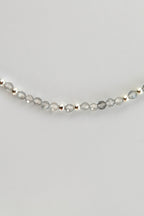 3mm labradorite gemstone and silver bead bracelet on a white background